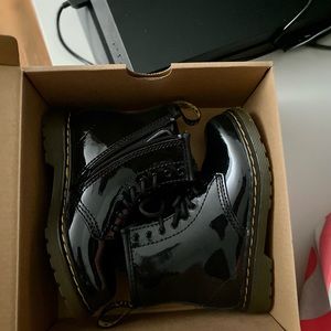 Little girls Dr. Marten black patent leather boots